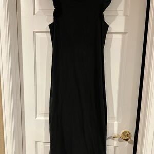 Cute cotton midi dress with ruffle cap sleeves and slit sides.